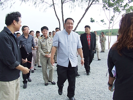 Deputy Prime Minister and Finance Ministry Chief Kittiratt Na-Ranong and his entourage of top government officials arrive to inspect Mabprachan reservoir. 