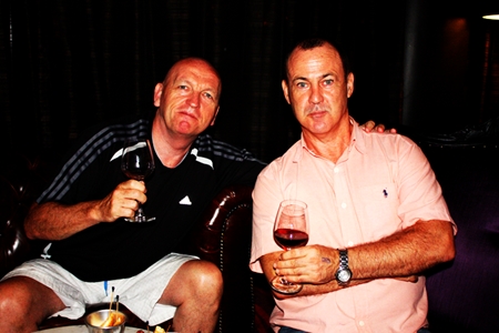 Duncan Murray and Tony Ryan, boxing trainer, personal trainer and fitness advisor sip red wine as it is better for your health than beer.