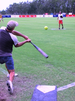 Brian hits his 1st homerun of the day off a pitch from Rick S.  Dirk at 1st base and Rodney at 2nd look on in amazement. 