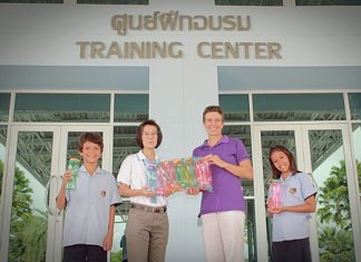 Choawanee Panpruk, Social Enterprise Manager from sponsors PTTCG, gave 300 water bottles to Miss Lucy for GIS students to use at the Games.