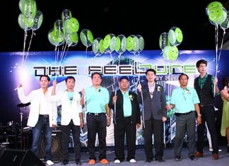 Wornchai Phakdeesaneha, MD of Real Estate of Porchalnd Group, center, and Phokpol Phakdeesanwha, MD of Porchland, 2nd right, stand with Chonburi MP Porames Ngampichet, 3rd right, and other dignitaries and presenters at the launch of The Feelture condominium.
