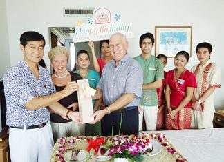 Staff of the Montien Hotel Pattaya presents Robert James Claney with a gift on the auspicious occasion of his birthday recently.