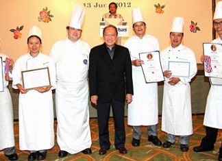 GM Chatchawal Supachayanont (centre) and Executive Chef Adrian W. O’Herlihy (3rd left) stand proudly with the Kitchen Team of Dusit Thani Pattaya who received certificates of commendation at the Thailand Ultimate Chefs Challenge 2012 held in Bangkok recently. The event was held to promote and recognize the skills and talents of professional chefs in Thailand. (L to R) Srithon Pongham, Chef de Partie (Patisserie); Khanatsanan Wangsa, Commis II (Patisserie); Chef Adrian, Chatchawal Supachayanont; Somchai Kumpoo, Demi-Chef de Partie (Gardemanger) and Narong Chawicha (Chef Pâtissier). The kitchen talents took home the silver and bronze awards from the Fruit Carving and Ice Carving categories as well as Western Plated Desserts and Freestyle Showpiece challenges.