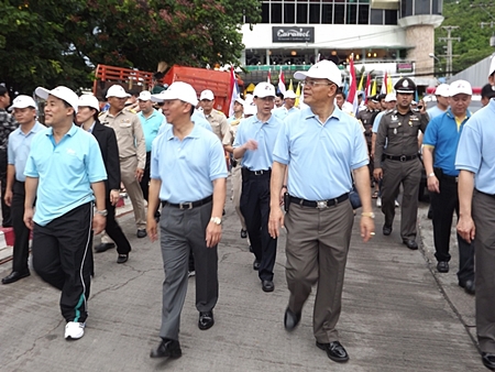 Government officers, police, soldiers, private and public sectors march in the anti-drug parade.