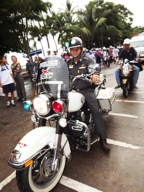 Pol. Col. Somnuk Changate leads the big bike parade.