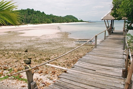 Wooden jetty on Big Bay, Talu Island. Situated about 600 kilometers south of the capital on the Andaman Sea coast, the Bang Saphan neighborhood is becoming an increasingly popular stopover for tourists bored of Thailand’s better known attractions. (Photo Credit: Ton Gerrits)
