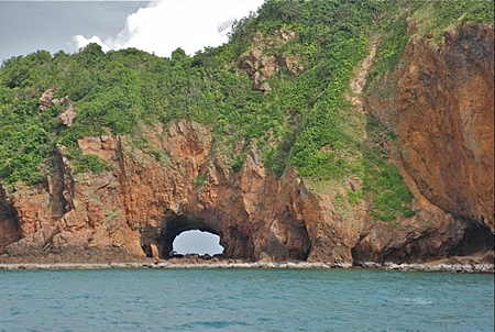 Koh Talu, named after the tunnel that defines its western tip. Talu means tunnel in Thai. Talu provides the closest decent snorkeling venue for tourists staying at Hua Hin, one of Thailand’s popular beach resorts which is just a three-hour drive from Bangkok. (Photo Credit: Ton Gerrits)