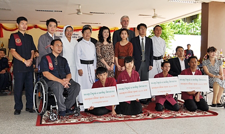 Students from Redemptorist Vocational College receive scholarships from Pol. Col. Dr. Yanyong Pattaloho, CEO of Thai Pipe Co., Ltd., during the annual wai khru ceremony.