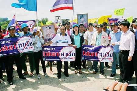 Residents from 4 Chonburi districts protest the planned Phase 3 expansion of Laem Chabang port.  Officials have temporarily suspended the 120 billion baht expansion plan after their angry neighbors threatened to shut down the harbor. 