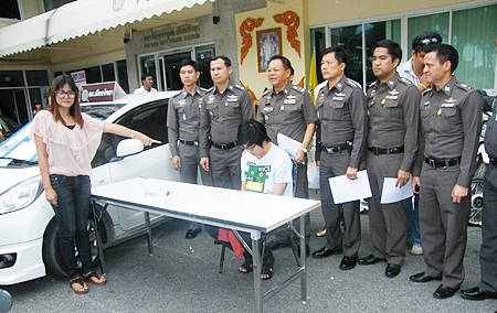 The victim points to the man who “borrowed” her heart, then stole her car. 