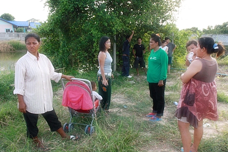 Anxious residents gather around a local fishing pond, fearing for a young boy’s life until learning that it was all just a cruel hoax. 