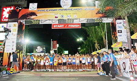 Athletes line up at the start on Pattaya Beach Road.