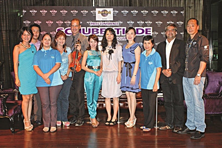 Organizers, artists and board members of the Y.W.C.A. Bangkok – Pattaya Center pose for a group photo at the press meeting.