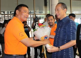 Chudet Sukharam (left), president of the Pattaya Tourist Guide Society greets Khomsan Ekachai (right), Governor of Chonburi province who attended a tourism related seminar at Pattaya City Hall Pattaya City hall recently.