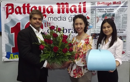 Tony Malhotra, Asst. MD of the Pattaya Mail Media Group receives a bouquet from Usa Pookpant, PR manager and Wirasinee Kaewkeeree, PR executive of Centara Grand Mirage Beach Resort Pattaya to congratulate us on our recent 19th anniversary. Tony Malhotra, Asst. MD of the Pattaya Mail Media Group receives a bouquet from Usa Pookpant, PR manager and Wirasinee Kaewkeeree, PR executive of Centara Grand Mirage Beach Resort Pattaya to congratulate us on our recent 19th anniversary.