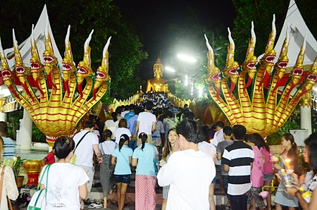 Thousands of people take part in the Wien Thien ceremony at Wat Phra Yai.