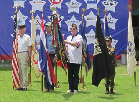 Color Guard at present arms during ID4’s opening ceremony in Bangkok. Left to Right: Rad Mays, Jim Coomes, Rick Reece and Young Marines PFC Bret Mays.