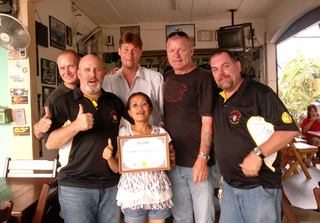 Martin Simonsson and his wife receive their certificate of appreciation from the Jesters for this year.