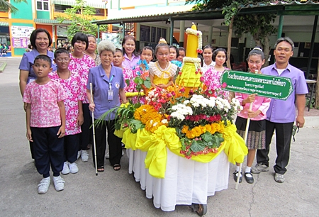 Aurora Sribuaphan (front row with cane), director of the Redemptorist School for the Blind, poses for a picture with her students.