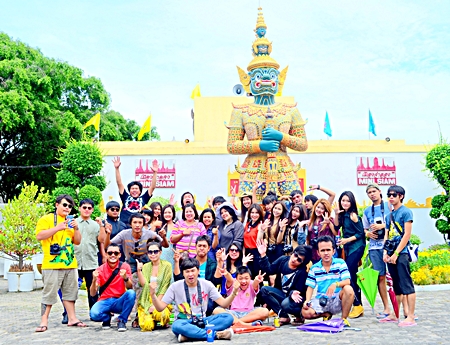 Students from Buriram Rajabhat University pose for a group picture during their field trip to Mini Siam. 