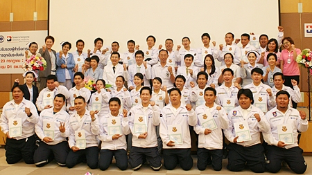 All 33 successful trainees of the Emergency Medical Technician-Basic Curriculum pose for a class photo with instructors and organizers. 