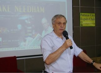 Fellow author Desmond Bishop introduces renowned writer Jake Needham to the August 12th meeting of Pattaya City Expats Club.