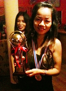 Tournament winner Pin with her trophy.