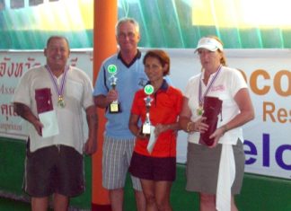 Mixed Doubles League winners and runners-up pose with their trophies.