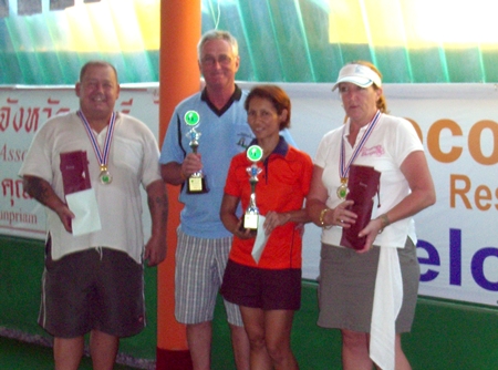 Mixed Doubles League winners and runners-up pose with their trophies.