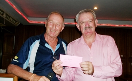 Sunday’s winner Paul Bray, right, with golf manager Colin Davis. 
