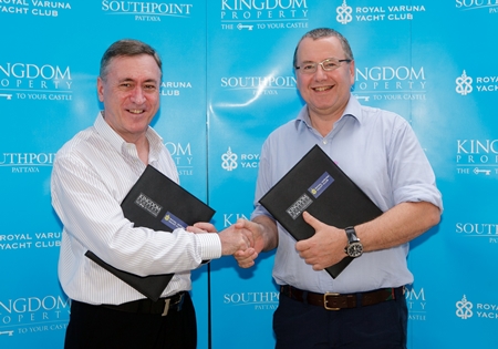 Nigel Cornick, left, CEO of Kingdom Property, shakes hands with Royal Varuna Yacht Club Commodore Simon Makinson, right, to cement the new sponsorship agreement. 