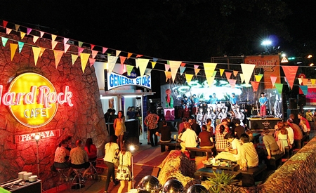Thai and foreign guests dance the night away at the party.