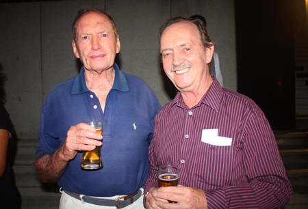 Men about town Vic Cross and Stephen Beard chat over a beer.