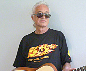 Jimmy Page came back to play some more on the guitar he is donating.