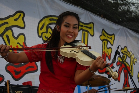 Pukpik entertains the crowd with her magical violin.