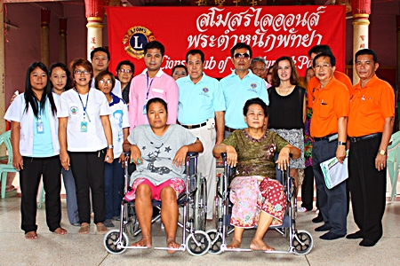 Area Lions Clubs donate wheelchairs to disabled residents from nine local neighborhoods. 
