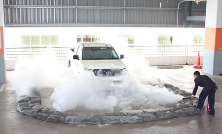 Employees are shown what to do in case of a fuel leak in the parking garage. 