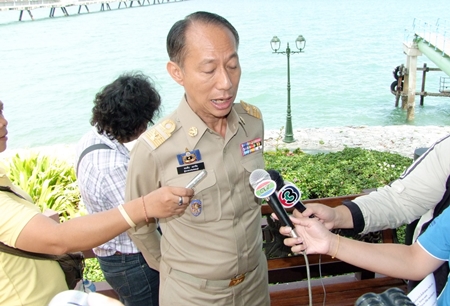 Chonburi Gov. Khomsan Ekachai answers media questions during the emergency drill. 