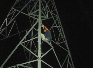 Wijit Saothong climbed an electricity tower and refused to come down.