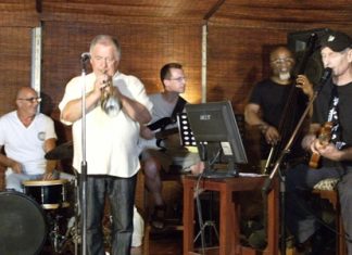 International artists (left to right) Peter Couling on drums, Paul Erik on trumpet, Michael Sternbacher on guitar, Jair-Rohm Parker Wells on bass, and Thomas Reimber on guitar - synthesizer, jamming the night away at the Jazz Pit on Soi 5.