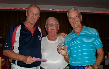 Colin the golf manager, left, presents to Mike Craighead and Claude Harder. 