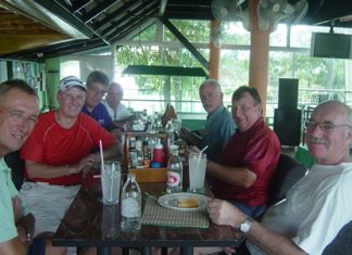 Golfers enjoy some post game camaraderie at Mulligans Lakeside.