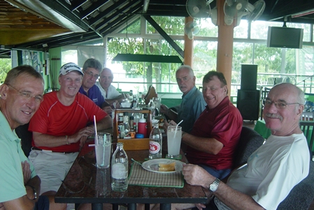 Golfers enjoy some post game camaraderie at Mulligans Lakeside. 