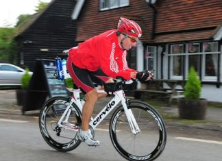 Matthew Springall competes in the 180km cycling leg of the Challenge Henley triathlon on Sunday 16 September, Oxfordshire, England.