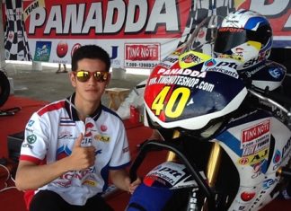 Ben Fortt poses next to his Honda CBR 1000cc race bike.