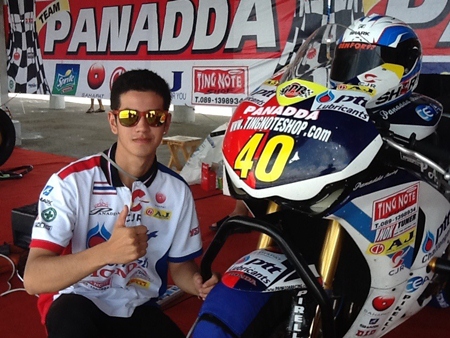 Ben Fortt poses next to his Honda CBR 1000cc race bike. 