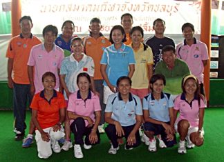 Thailand’s elite lawn bowlers pose for a photo at the Coco Club in Pattaya, Sunday, Sept. 2.