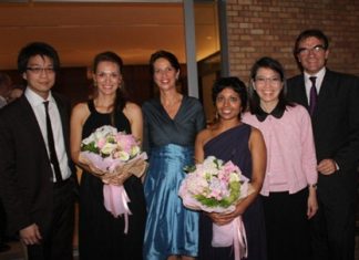Swiss ambassador, Christine Schraner-Burgener (3rd left), poses with the two artists and other guests at the conclusion of the concert on Sept. 21 in Bangkok.
