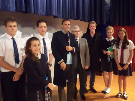 Performance Exchange Theatre Company actors Daniel Foley, Nigel Mills-Thomas and son Max answer students’ questions following their performance. 