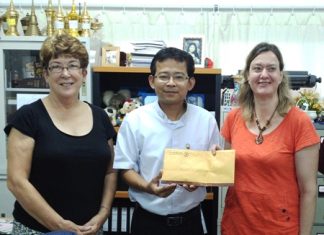 PILC president Ann Winfield, Camillian Center director Father Peter, and PILC welfare chair Helle Rantsen with the club’s donation to the Center.